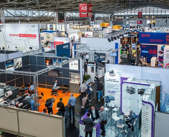 Exhibition Hall with stands and visitors at ICE Europe